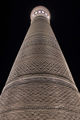 Night view at Great Minaret of the Kalon, one of the symbols of the city. Bukhara, Uzbekistan,...