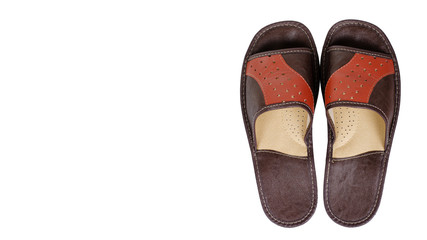 Domestic leather slippers, home shoes. Isolated on white.