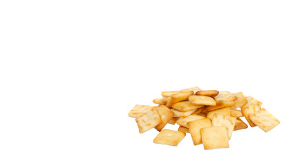 Square mini salted crackers, snack food. Isolated on white.