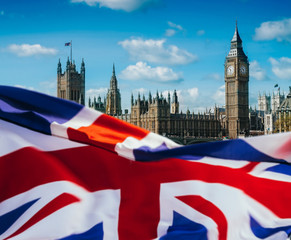 United Kingdom flag and Big Ben. London background. 