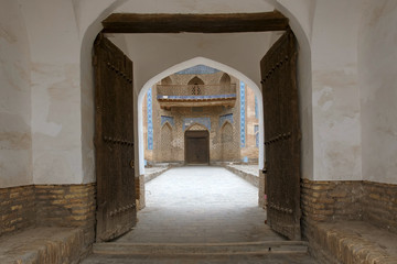 Gate of Mohammed Rakhim Khan Madrasah. Khiva, Uzbekistan, Central Asia.