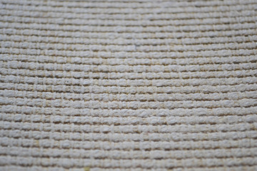 The wrong side of an old carpet, background