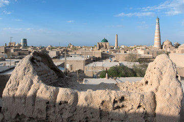 Old ruined tomb and view at Itchan Kala (old or inner city). Khiva, Uzbekistan, Central Asia.