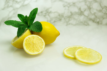Composition with lemons on white background.