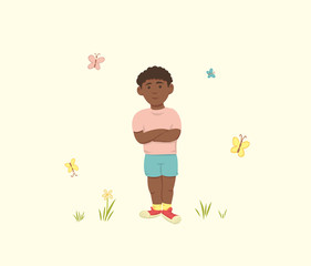 African American Boy Stands with Arms Crossed