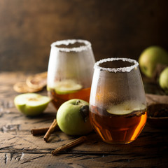 Homemade warming apple drink with fresh apples