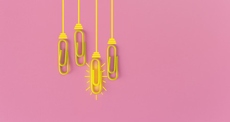 Great ideas concept with paperclip,thinking,creativity,light bulb on background,new ideas concept.