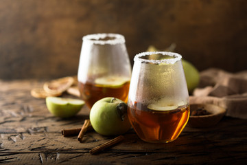 Homemade warming apple drink with fresh apples