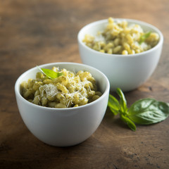 Pasta with pesto sauce and cheese