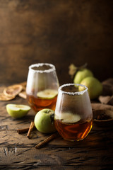 Homemade warming apple drink with fresh apples