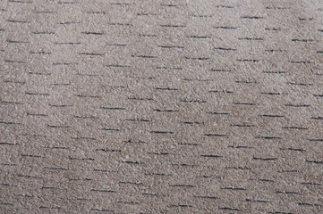 Gray fabric perforated background