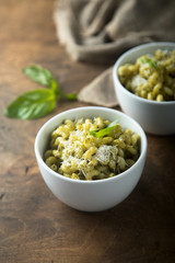Pasta with pesto sauce and cheese