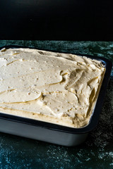 Frosting Chocolate Peanut Butter Cake Brownie in Square Mold.