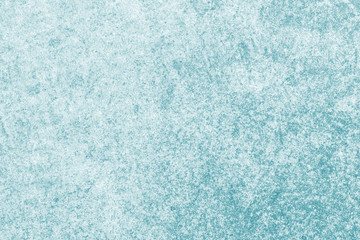 Obraz premium Modern turquoise paint limestone texture in blue light seam home wall paper concept for flat Christmas background, Back concrete table top floor, wall paper granite pattern, grunge seamless surface