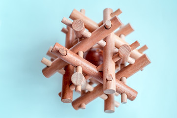 Wooden Brain Bamboo Puzzle on blue background