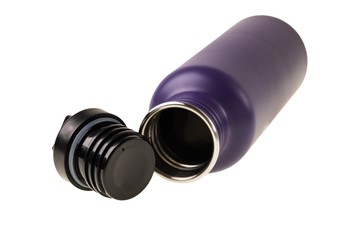 Close up view of purple stainless water bottle with black sport cap. Healthy lifestyle concept,