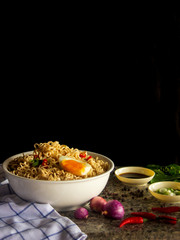 Instant noodles served on a marble table ready to eat