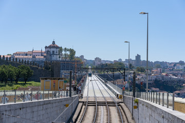 Fototapeta premium Subway railway tracks and electric cables on the superior deck of the Dom Luis I bridge