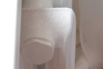 old vintage metal white heating battery at home apartment