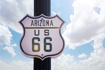 Obraz premium Arizona historic route 66 white old sign over blue sky, USA