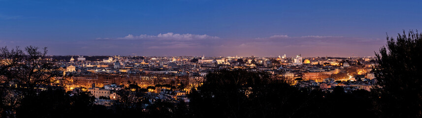 Fototapeta na wymiar Skyline Night panorama of Rome taken from the Janiculum Hill on historic center during blue hour