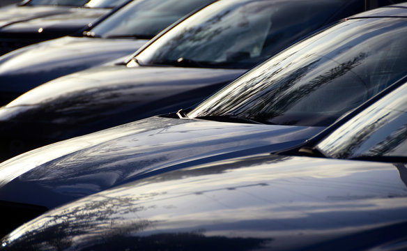 Cars parking in row close up
