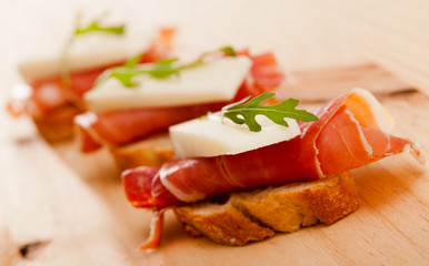 perfect sandwich made with rye bread cheese and Parma ham