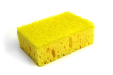 Yellow kitchen sponge for dishes , household cleaning is isolated on white background.