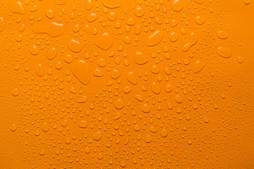 close-up water drop orange background