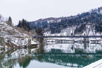 Fototapeta premium Bridge and river in winter season