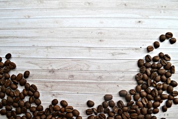 coffee beans on wooden background