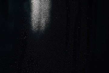 black glossy background with water drops