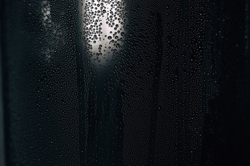 black glossy background with water drops