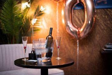 Table and seats  setup for romantic couple in a city Wine Bar