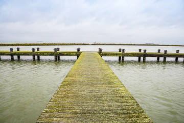 Fototapeta premium Pier in Markermeer by the road N701 between Almere and Lelystad in Netherlands