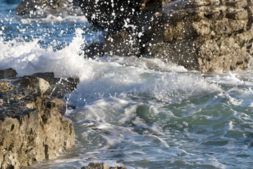 beautiful closeup sea wave and splashes on beach.