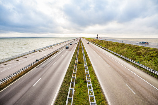Den Oever, Netherlands - January 09, 2020. Highway between two sees on the north of Netherlands splitting IJsselmeer and Waddeneilanden (Frisian Islands)