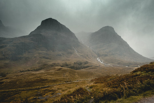 Cloudy and Rainy day by the Glen and mountains of the Scottish Highlands