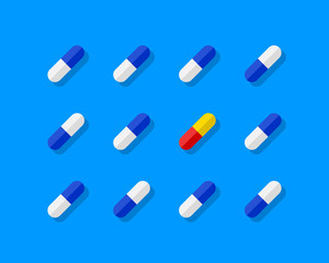 Pills in flat lay and top angle view with one pill being different from the others. Knolling concept on blue background and in flat design.