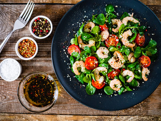 Prawn salad on wooden table