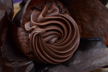 CHOCOLATE Muffins with Chocolate Cream and Paper Basket, Close Up