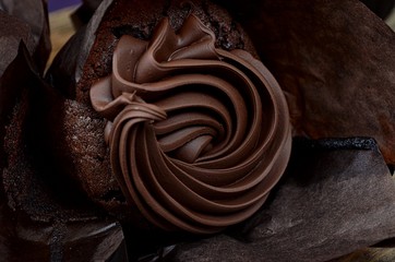 CHOCOLATE Muffins with Chocolate Cream and Paper Basket, Close Up