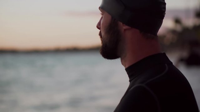 Swimmer Warming Up Workout.Professional Triathlete Preparing Swimming Swimmer Swimming Training For Triathlon Competition.Triathlete Preparing To Iron Man Triathlon Swim Competition.