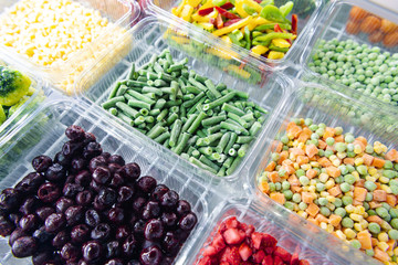 Frozen peppers and green peas. Freezing vegetables and fruits.
