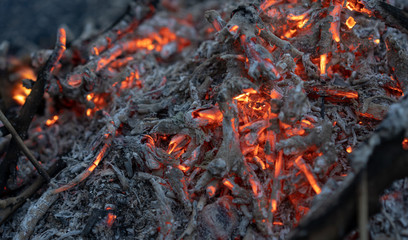 Heat from a bonfire with hot coals