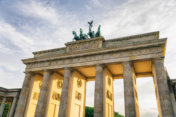 Brandenburg gate at sunset, german iconic interest location in Berlin