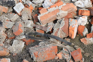 Construction waste with elements of and destroyed old structures at municipal landfill