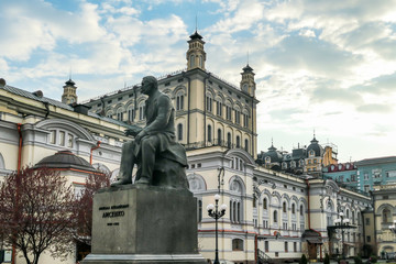 Fototapeta premium Kiev/Ukraine - 04 19 2019: A monument of Ukrainina pianist and composer, Mykola Lysenko, located in front of Kyiv National Opera House. Monument located on a little square.