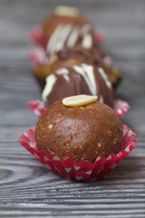 Chocolate Potato Cake. Garnished with walnut, trickles of chocolate or sprinkled. Against the...