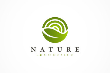Nature Logo. Green Leaf with Radial Rays of Sun isolated on White Background. Flat Vector Logo Design Template Element.